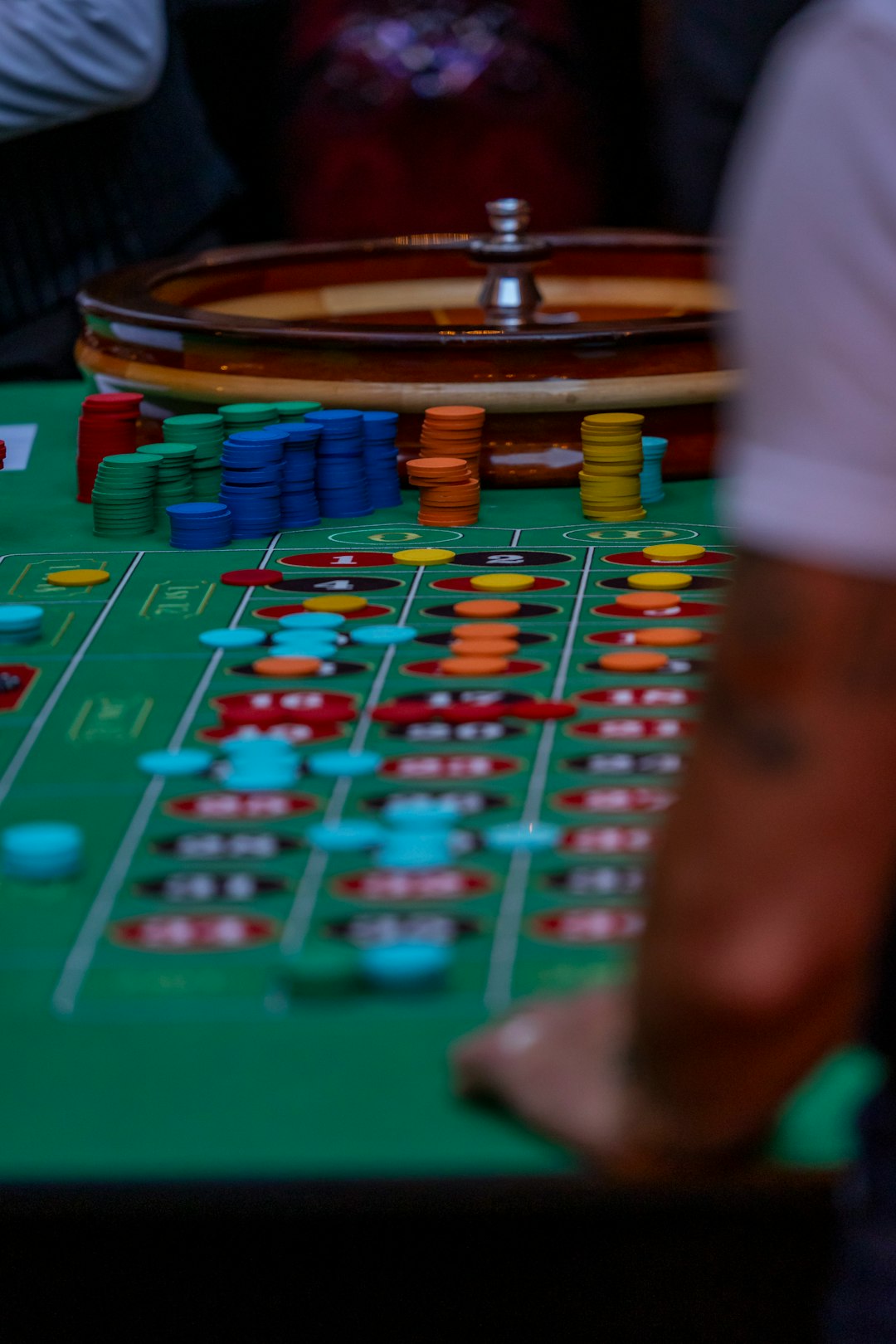 a-casino-table-with-a-lot-of-chips-on-it-lscwuellnom